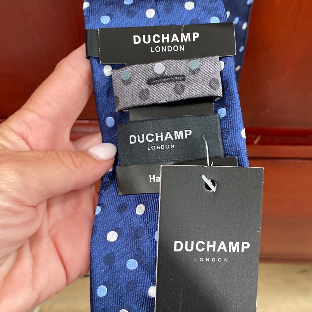 New with tags men’s blue and polka dot tie
